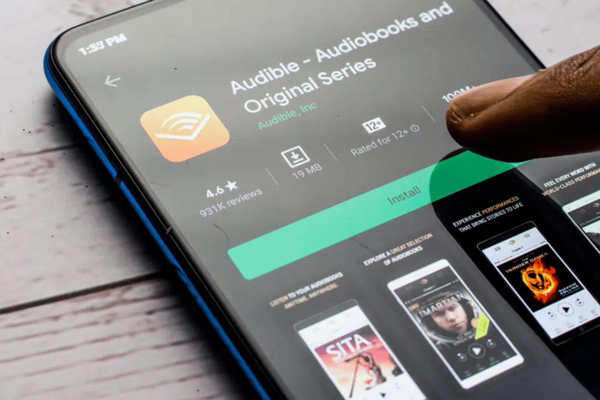 Audible app launches AI program allowing narrators to use voice replicas for faster audiobook production and enhanced customer experience.