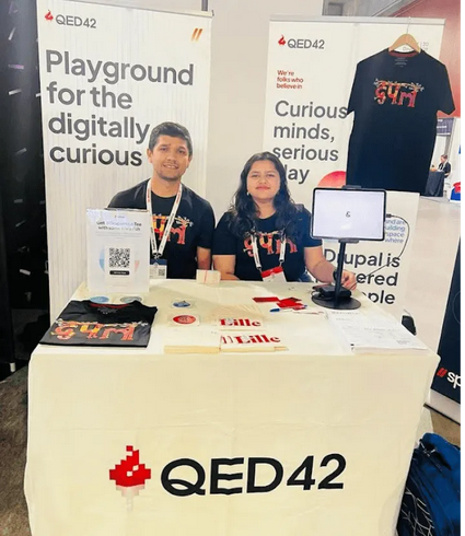 QED42's booth at DrupalCon Lille