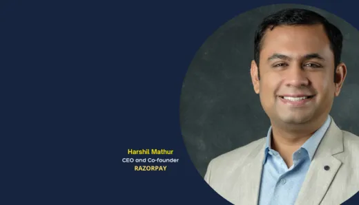 Harshil Mathur, CEO and Co-founder of Razorpay, smiling in a suit and tie.